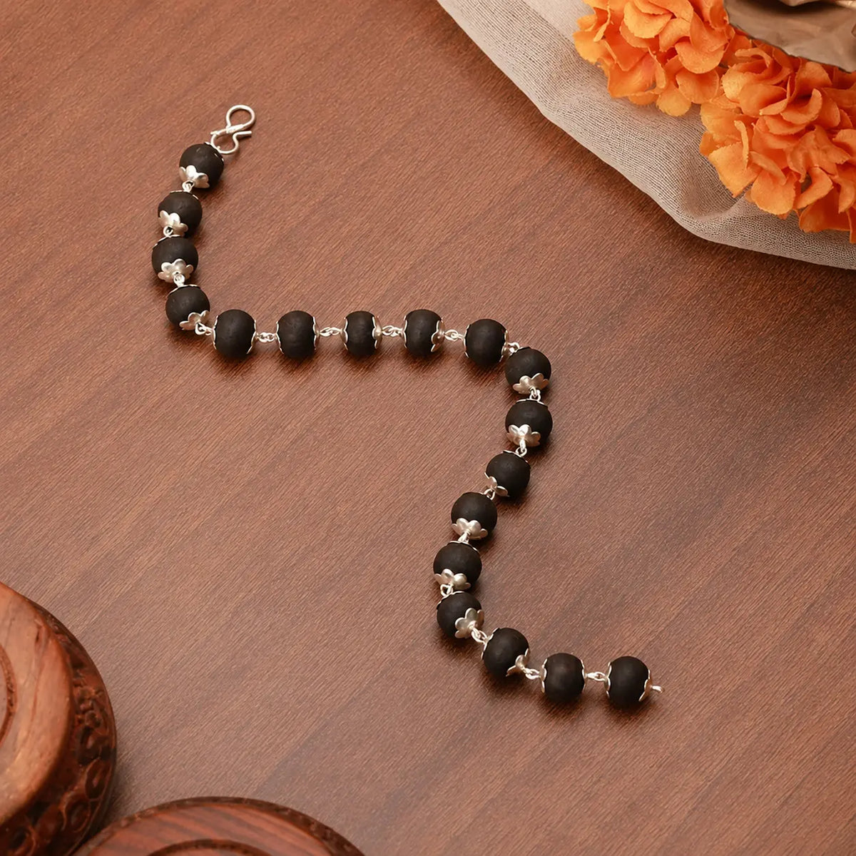 Karungali Beads Bracelet with Silver Plated Floral Caps